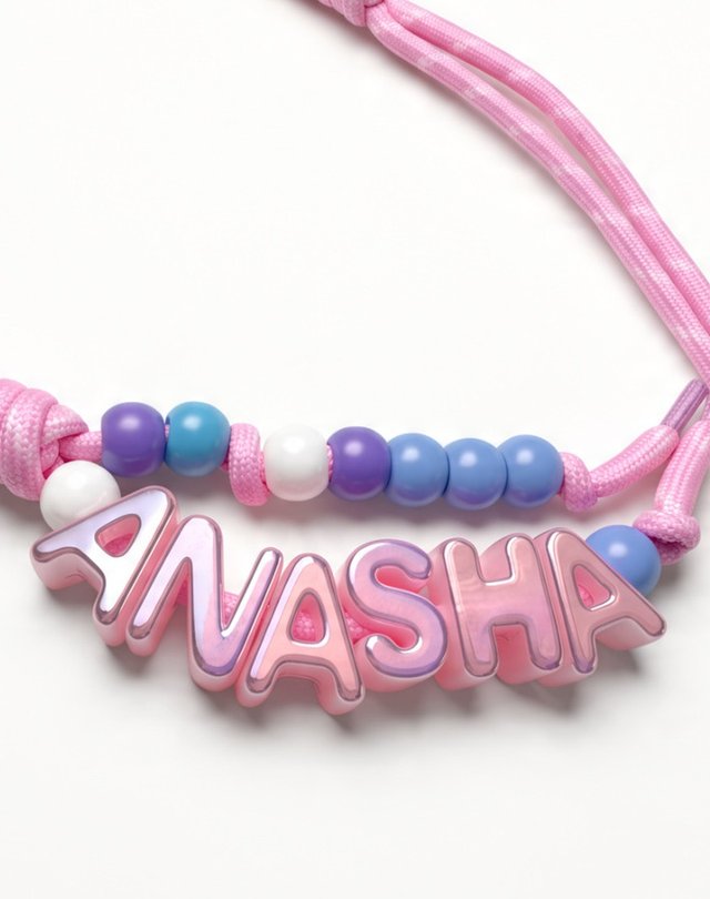 Pink paracord keychain spelling ANASHA with blue and lilac beads
