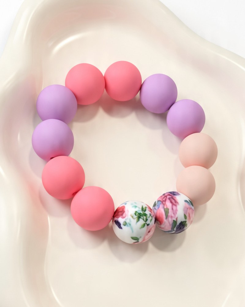 Coral, lilac and blush silicone bracelet with two floral beads